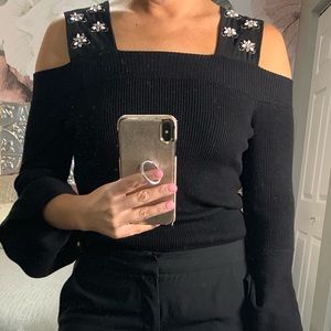 Off the shoulder embellished top.